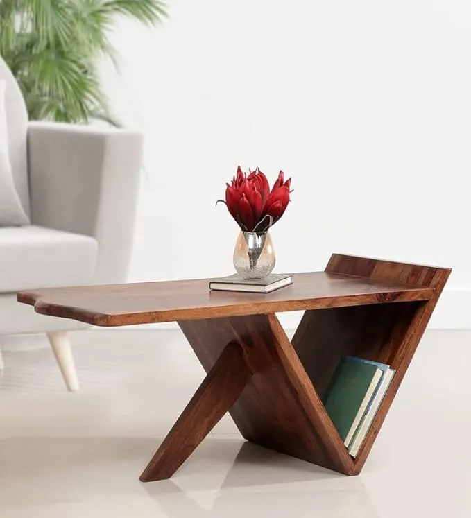 The wooden tone coffee table for living room use made from solid wood with storage shelf