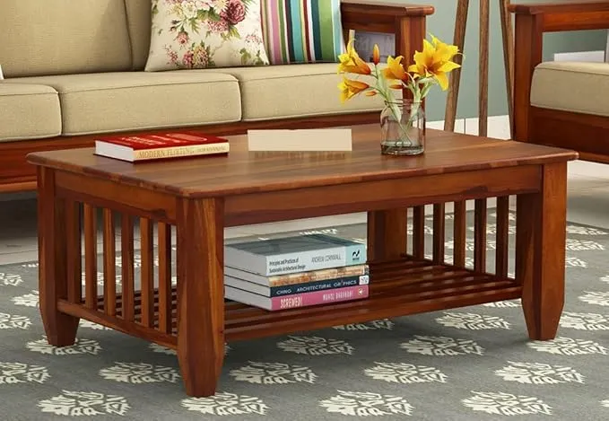The wooden tone coffee table for living room use made from wood with sturdy design