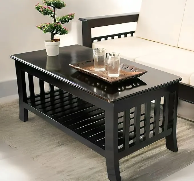 The wooden tone coffee table for living room use made from wood with sturdy black finish