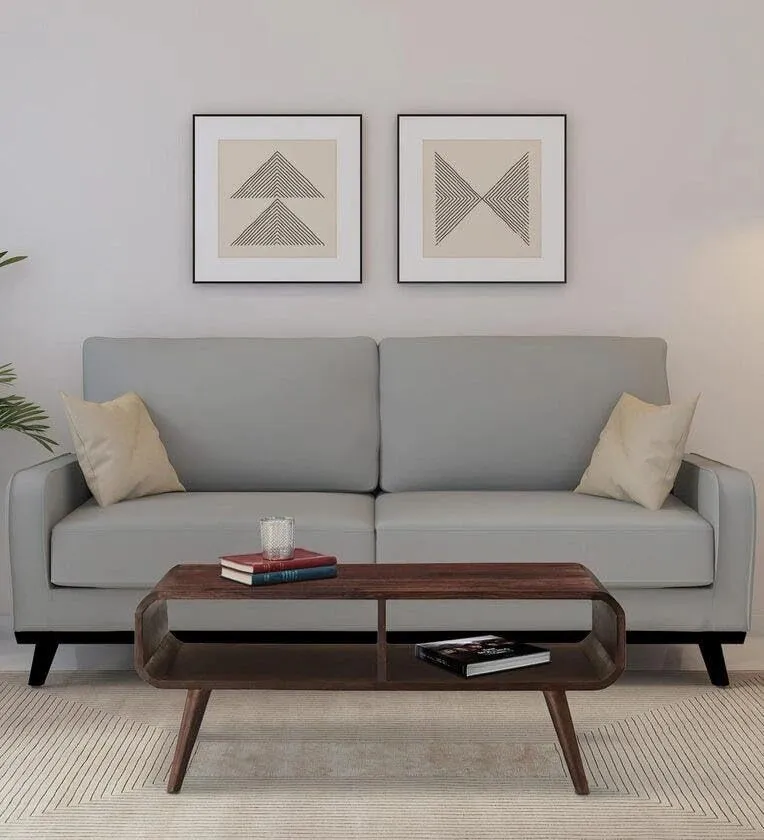 The wooden tone coffee table for living room and center use made from wood with sturdy design