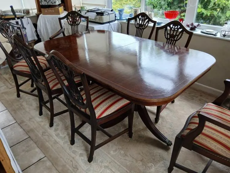 The wooden tone dining table set for family dining use made from wood with 6 chairs