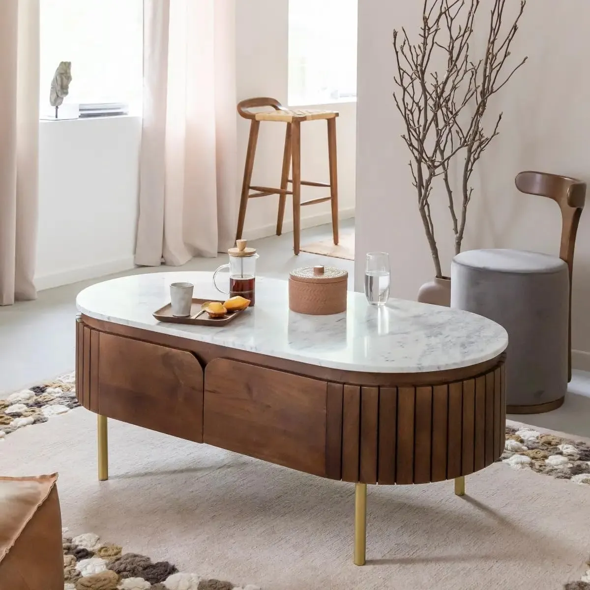 The wooden tone coffee table for living room use crafted from solid wood with ceramic top in brown and white finish