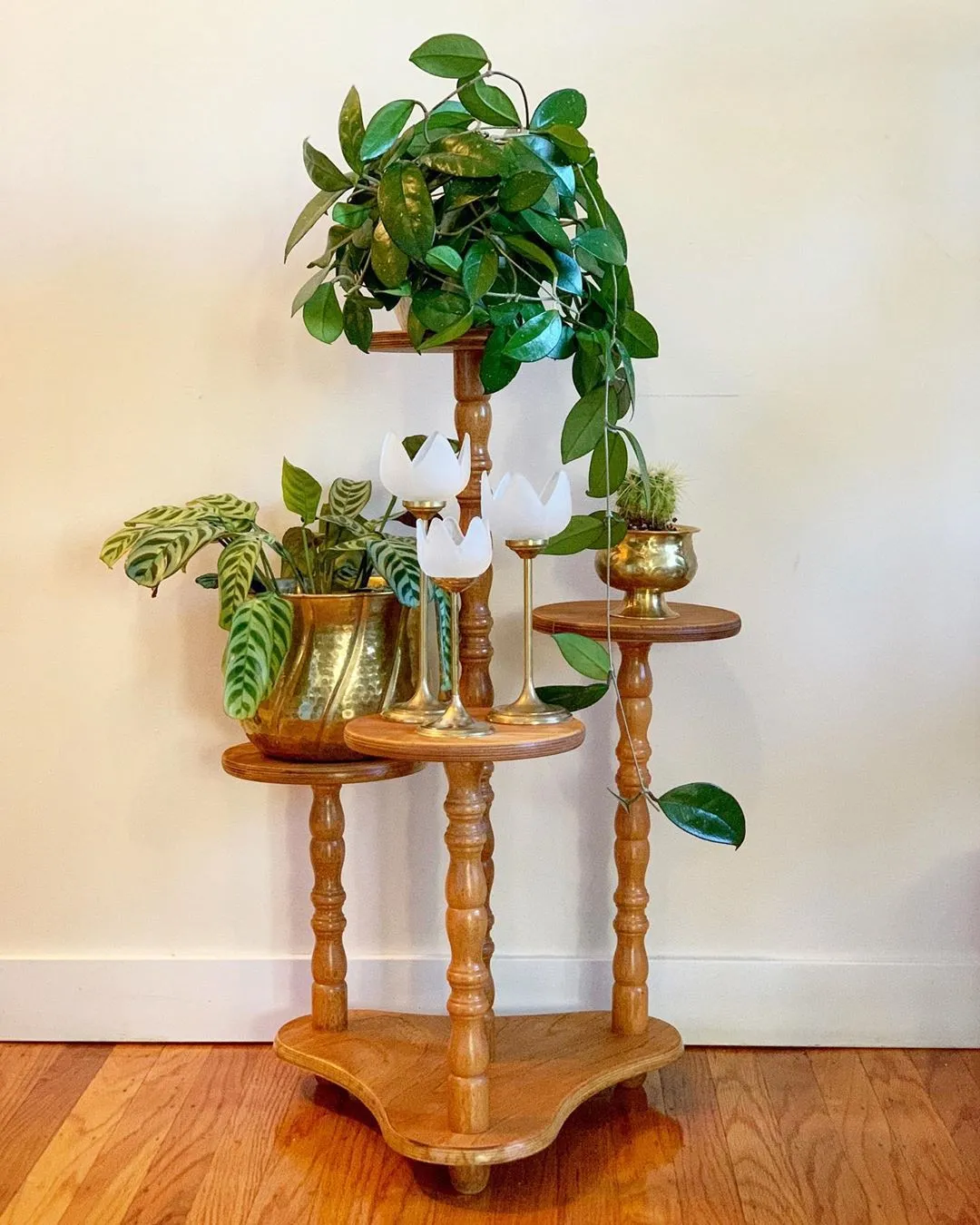 The wooden tone planter stand for home and balcony use crafted from wood in natural light finish