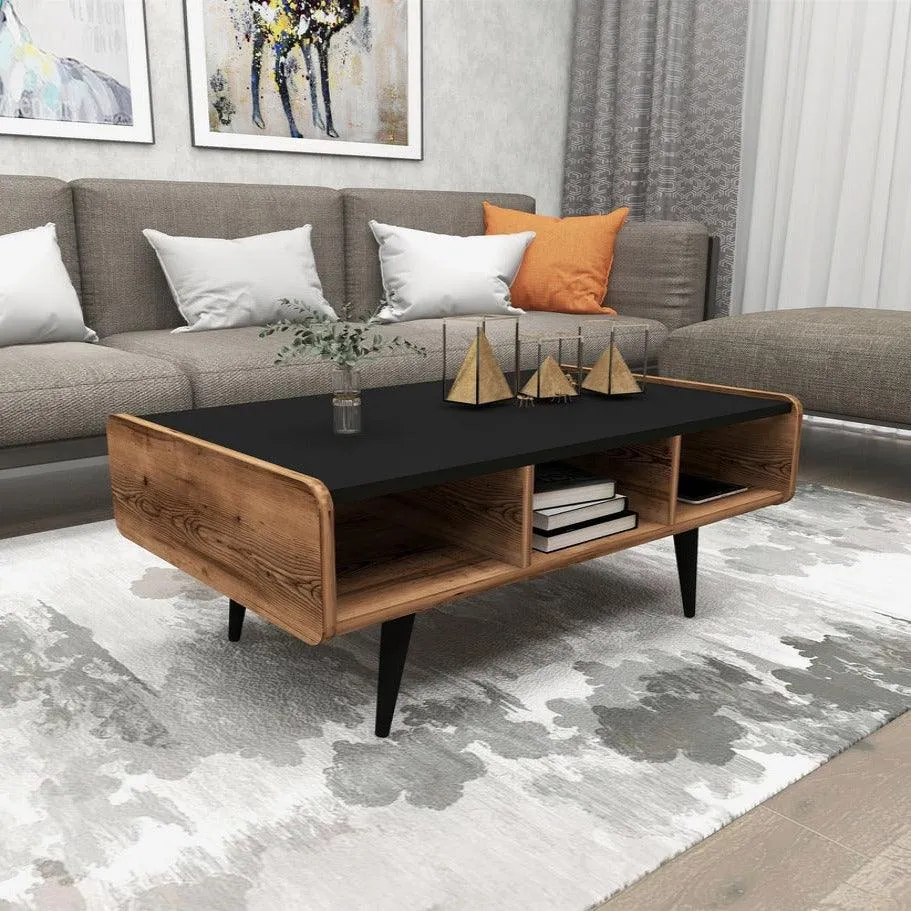 The wooden tone coffee table for living room use crafted from mango wood in black and brown finish