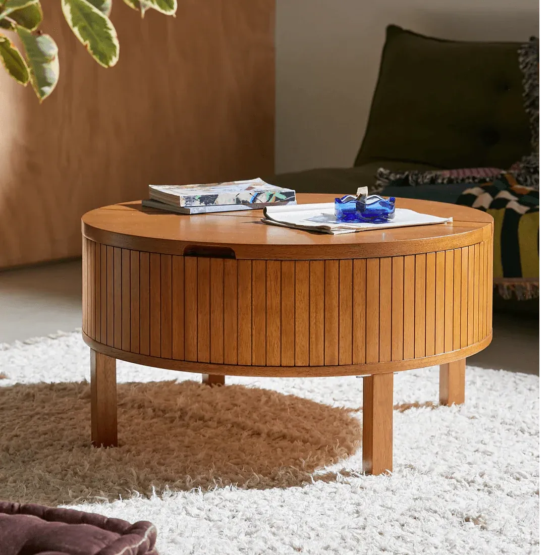 The wooden tone coffee table for living room use crafted from solid mango wood with storage in brown finish