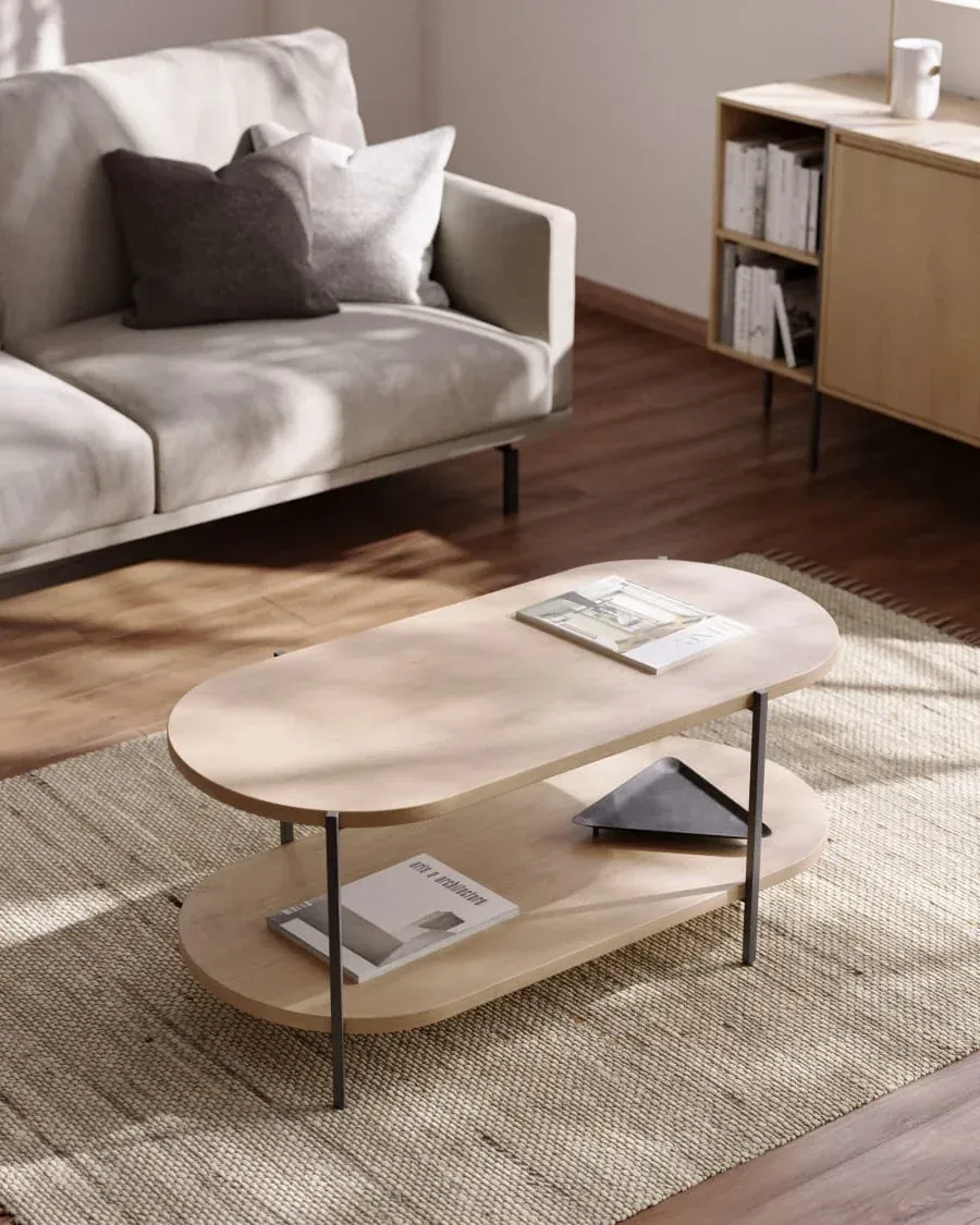 The wooden tone coffee table for living room use crafted from mango wood and iron in brown and black finish