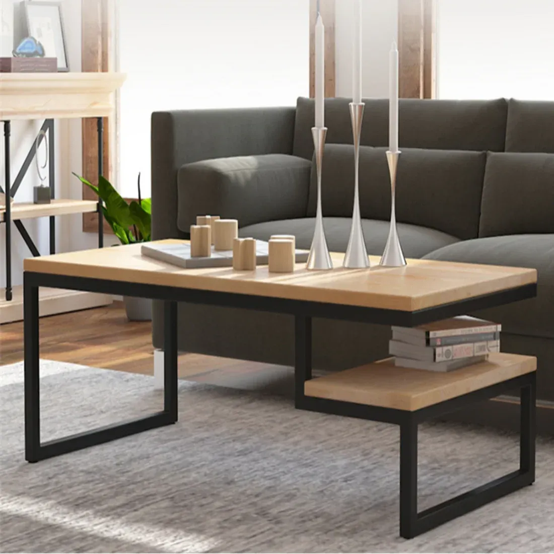 The wooden tone coffee table for living room use crafted from mango wood and iron in natural and black finish