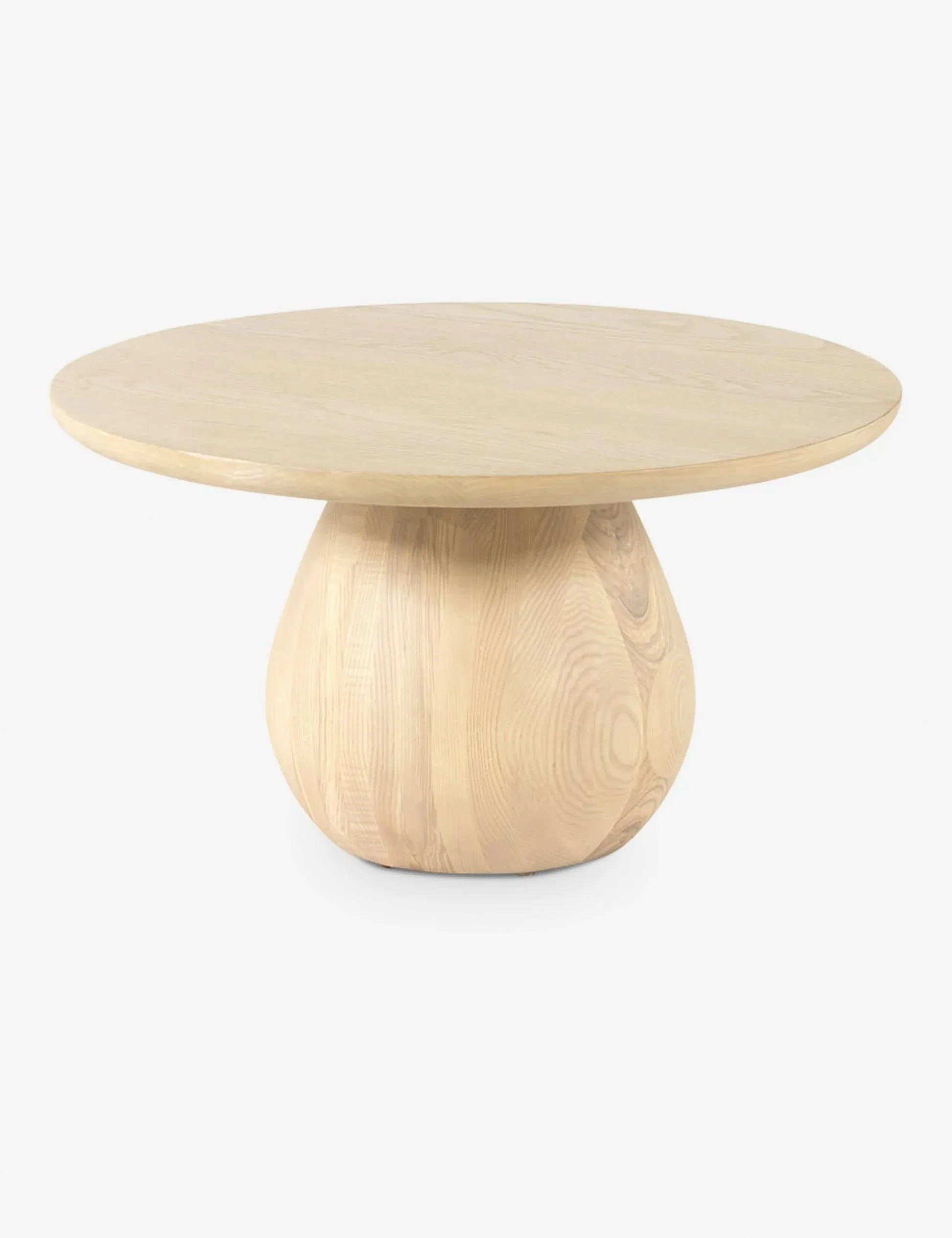 The wooden tone center table for living room use crafted from wood in natural finish
