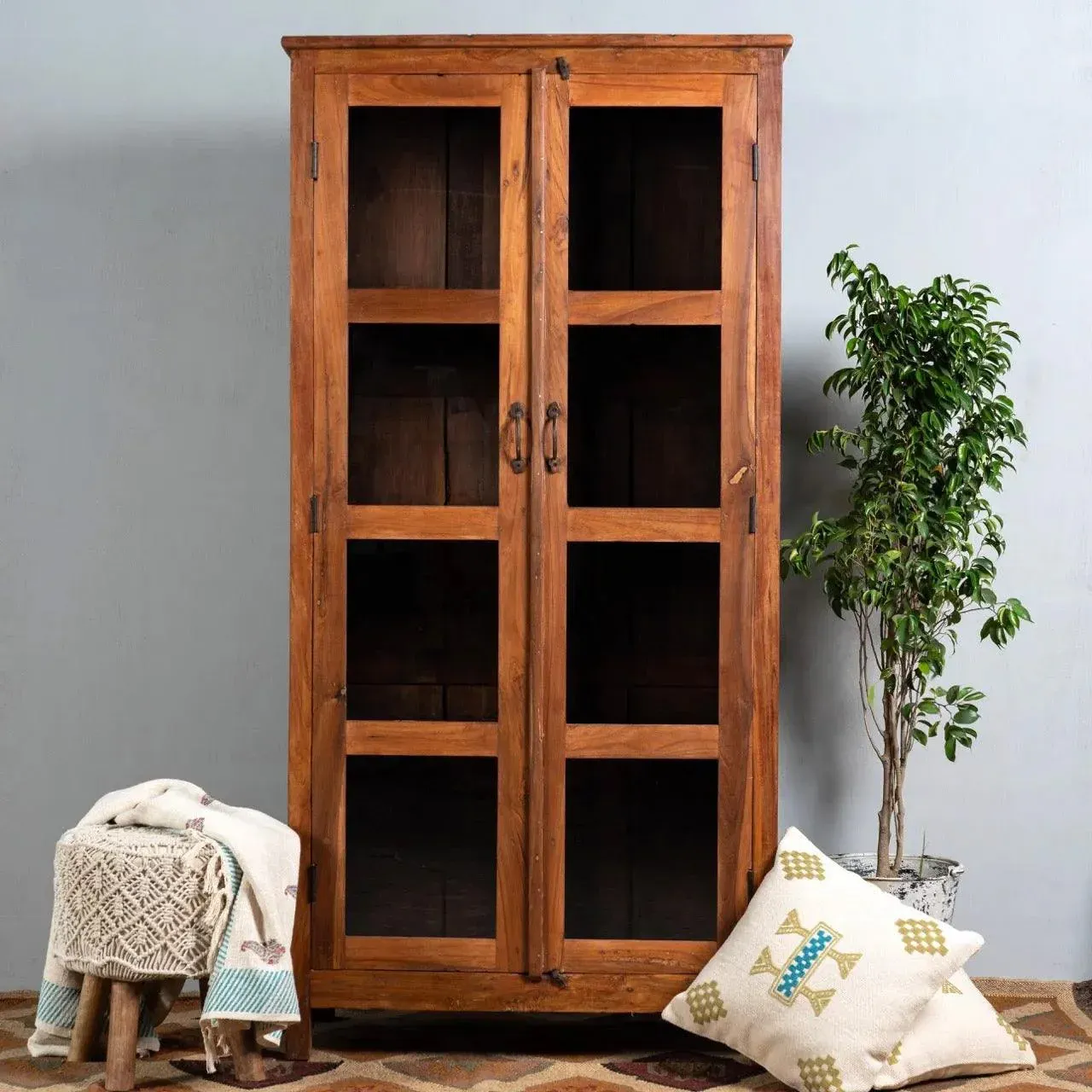 The Wooden Tone Mid Century Display Cum Cupboard for storage and display use crafted from durable wood material