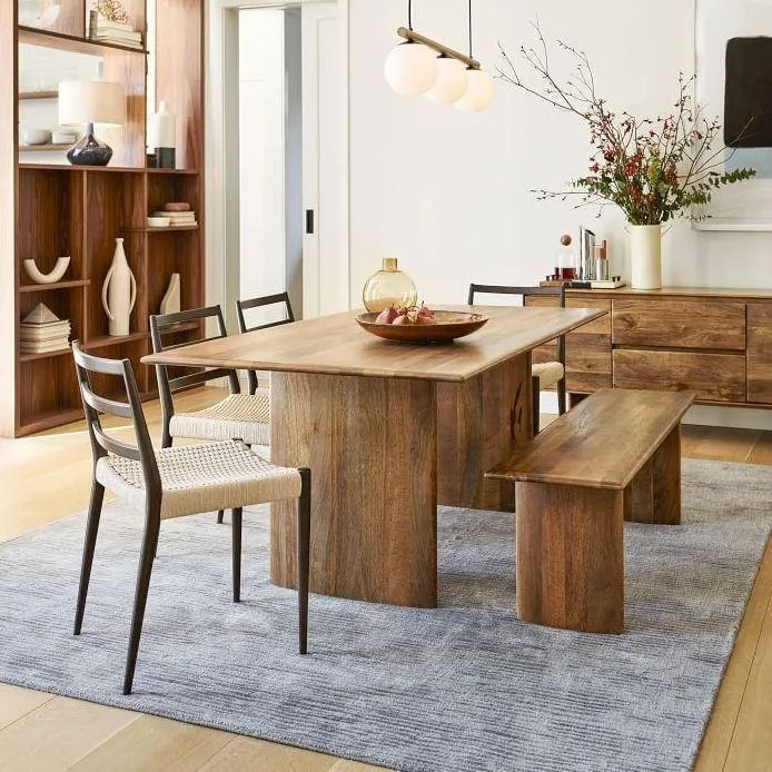 The Wooden Tone Dining Table for Dining Room Use Crafted from Durable Wood with Bench Seating