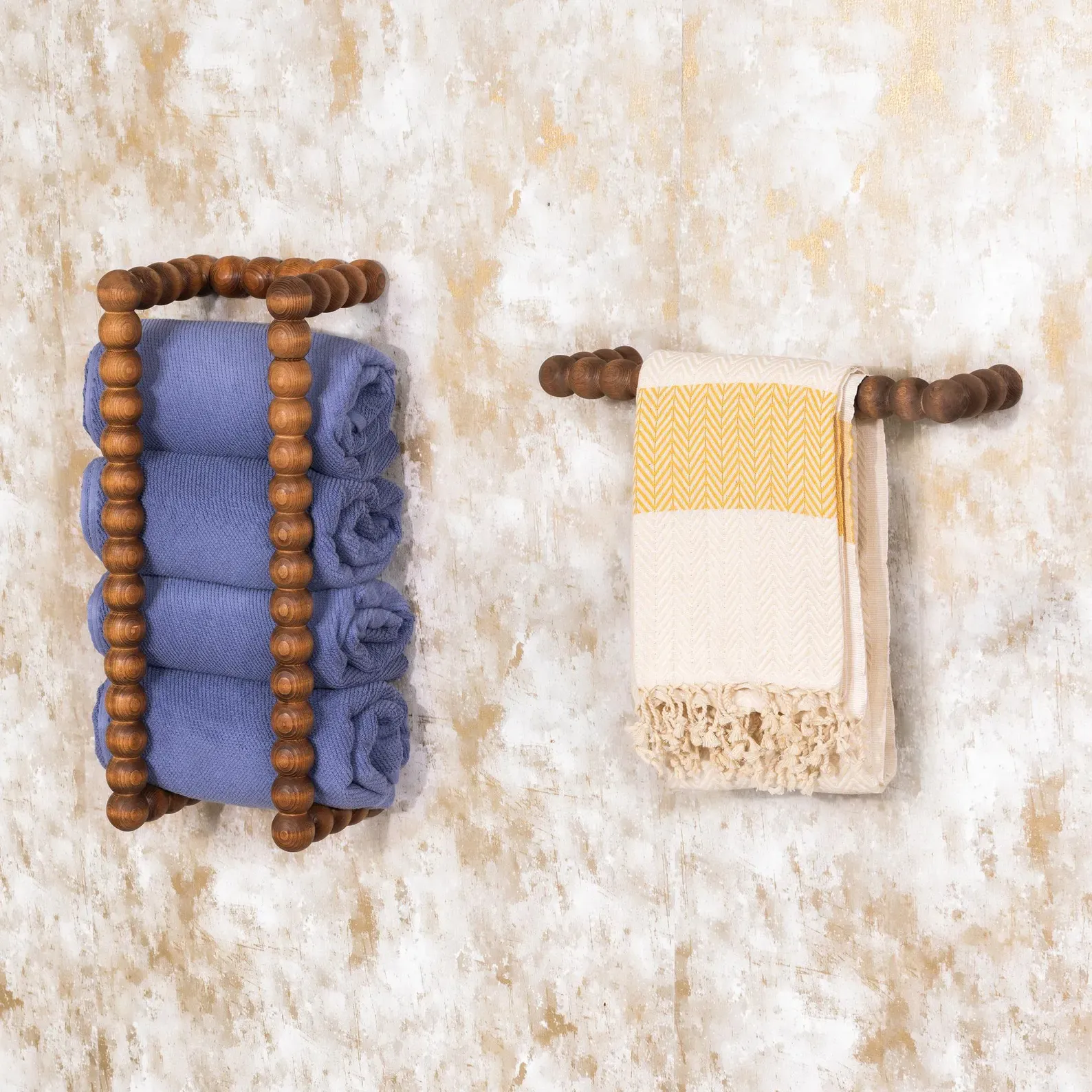 The wooden tone towel rack for wall use made from wood keeps towels organized in kitchen and bathroom spaces
