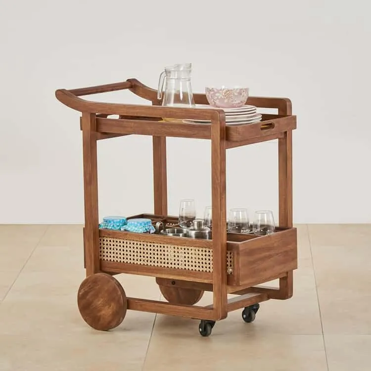 The wooden tone serving trolley foldable cart for kitchen use made from wood and cane offers easy movement and storage