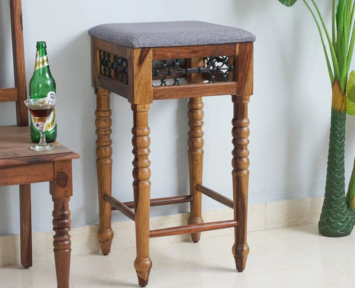 The Wooden Tone Bar Stool for Seating Use Made with Wood and Iron in Walnut Light Color