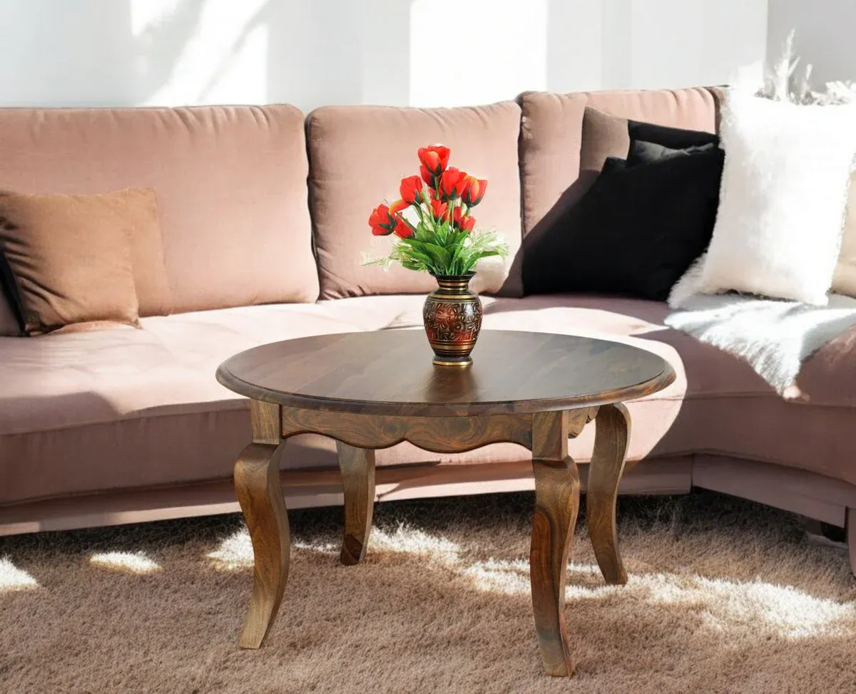 The Wooden Tone Round Coffee Table for Living Room Use Made with Wood in Brown Light Color