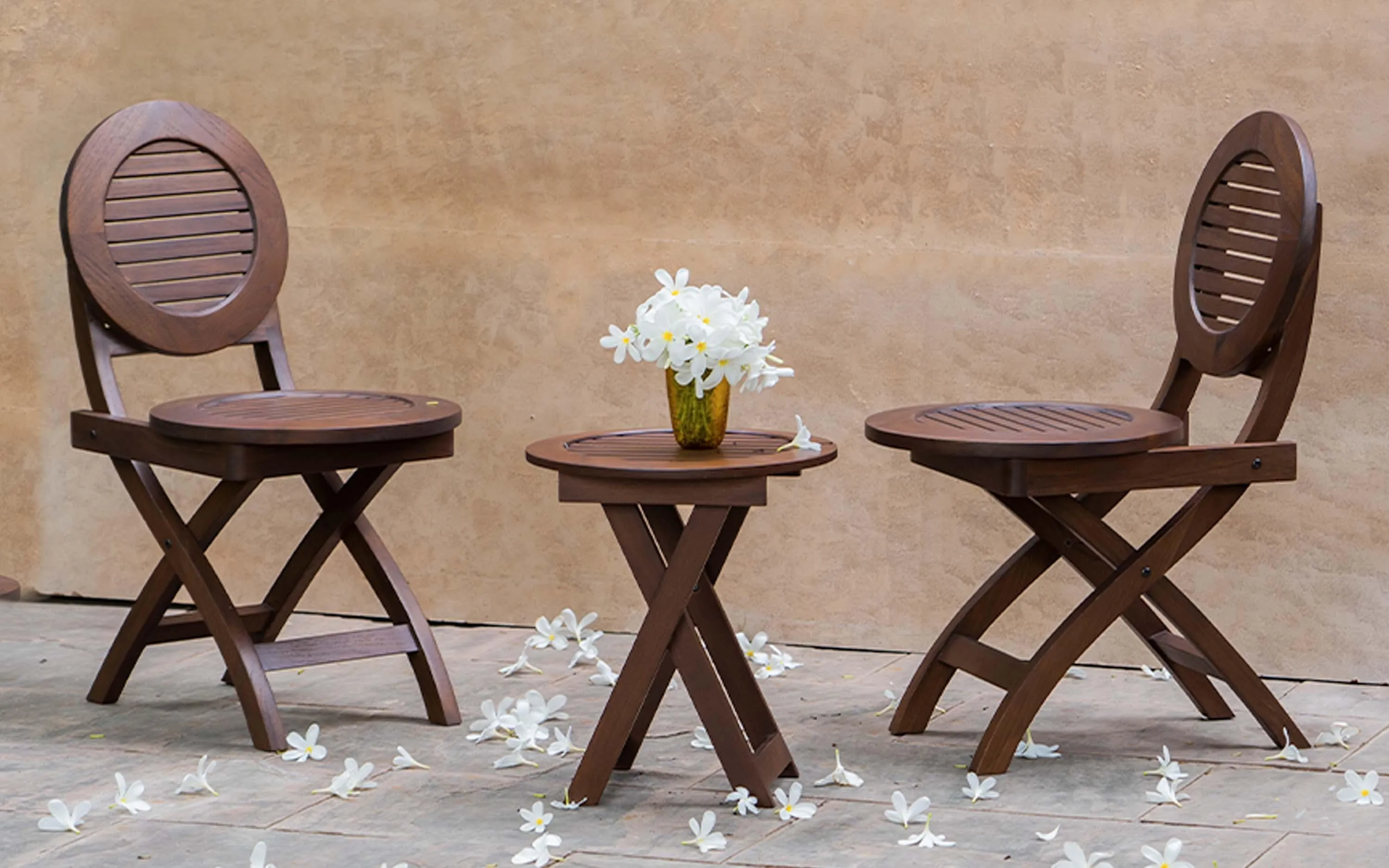The Wooden Tone Outdoor Folding Round Stool with 2 Folding Round Chairs for Outdoor Seating Use Made with Teak Wood in Mahogany Light Color