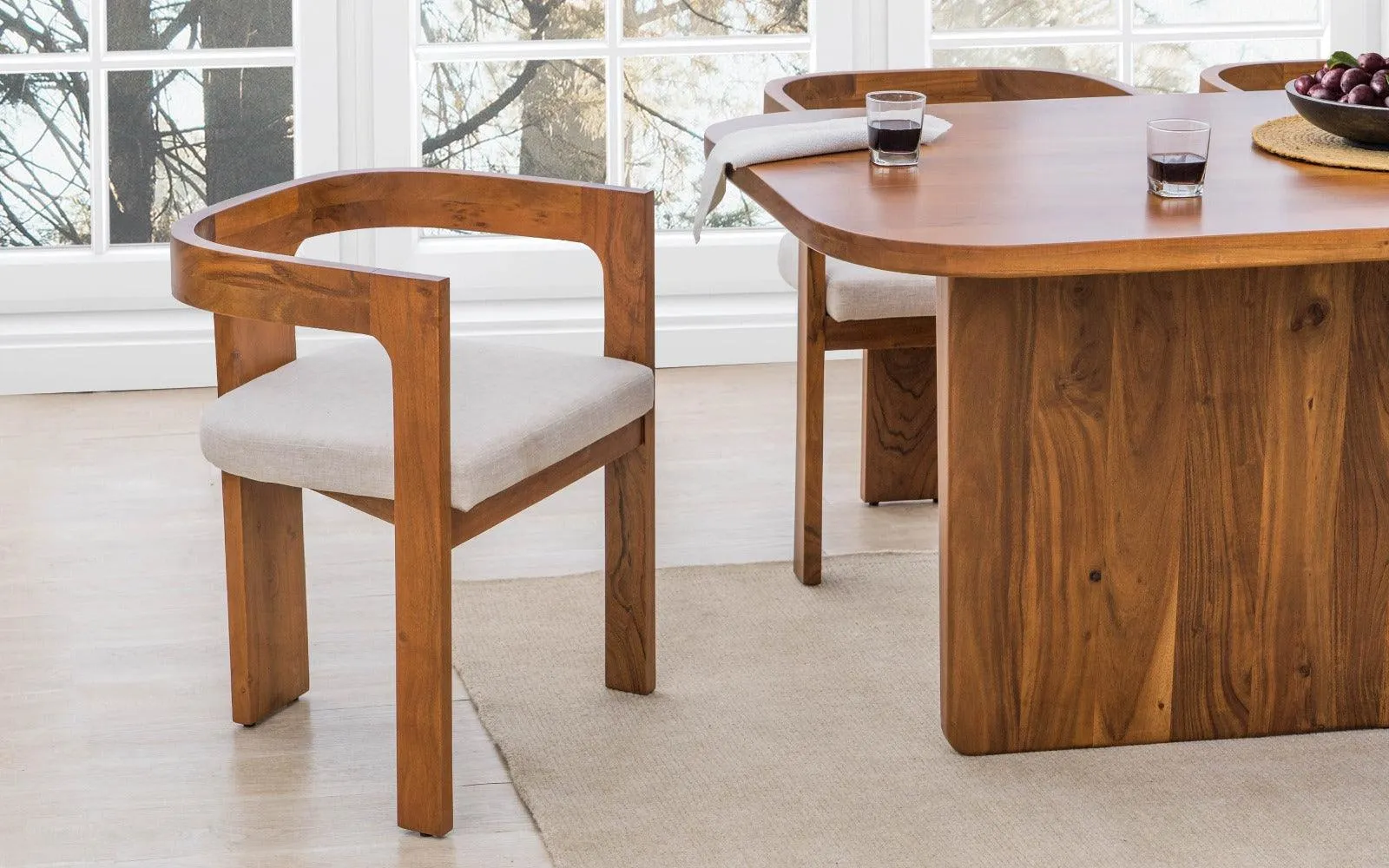 The Wooden Tone Arm Chair for Living Room Seating Use Made with Mango Wood Cane and Cushion in Natural Walnut Light Color